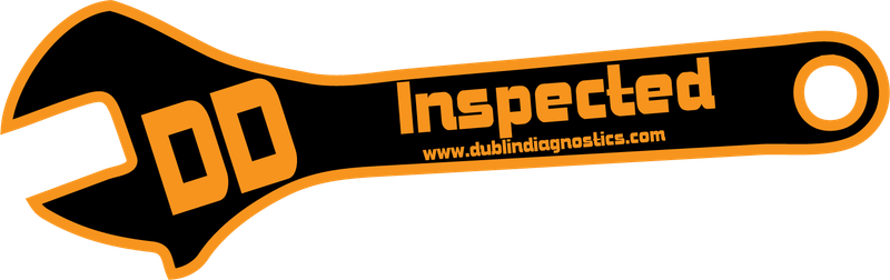The orange and black “DD Inspected” wrench sticker